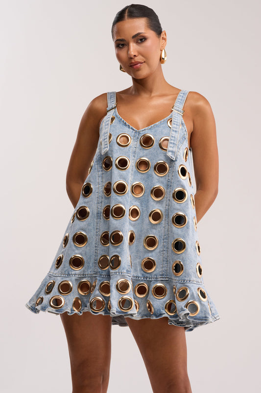 Light-wash denim-style mini dress with metal eyelet details